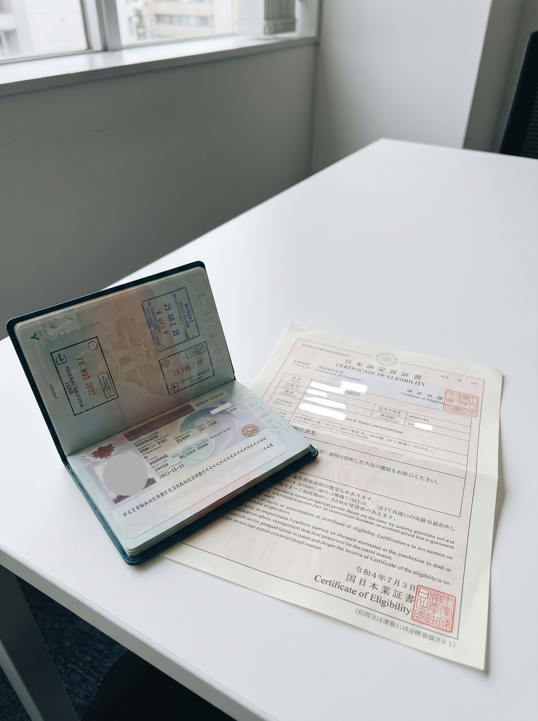 Indonesian passport and Japanese work visa documents